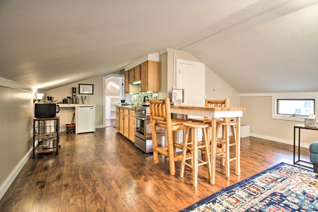 a kitchen with a table and chairs in a room at Idyllic Wallingford Retreat - Near Skiing and Hiking in Wallingford