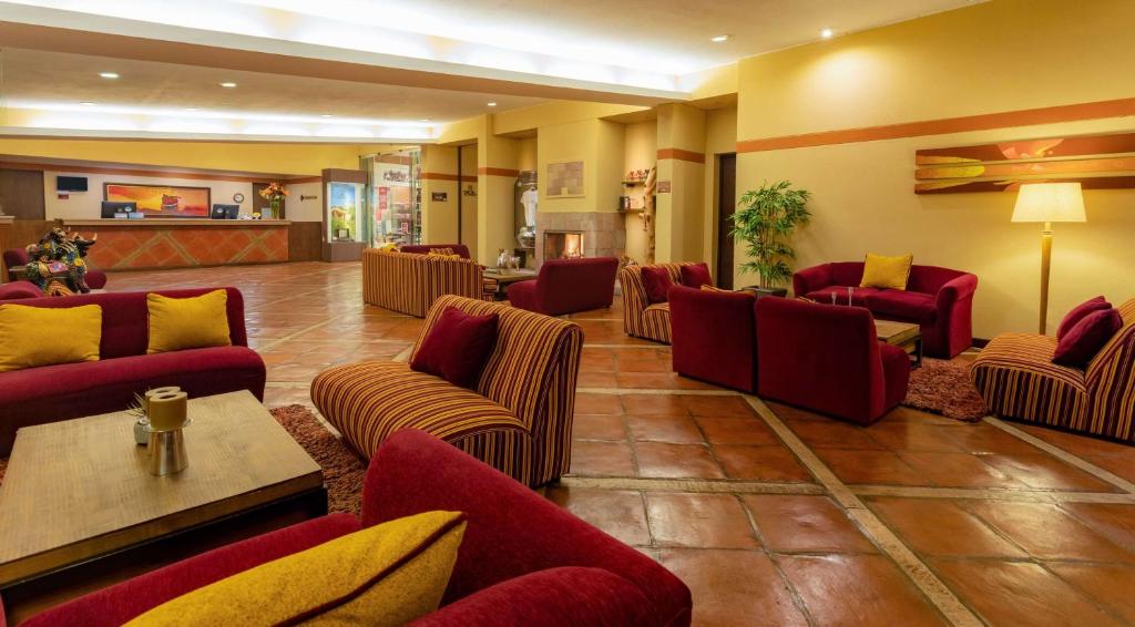 Uma área de estar em Sonesta Posadas del Inca Puno