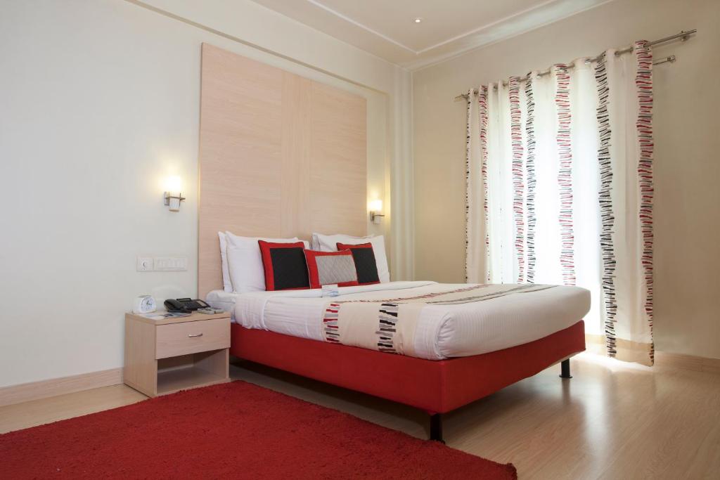 Postel nebo postele na pokoji v ubytování Avalon Courtyard Residence Suites