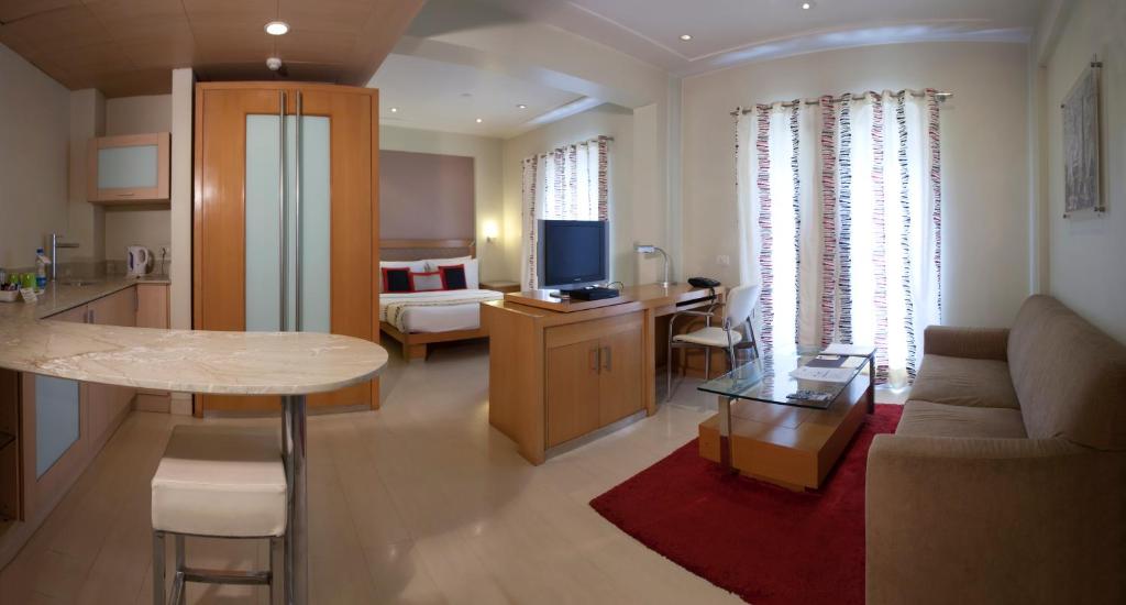 Kuchyň nebo kuchyňský kout v ubytování Avalon Courtyard Residence Suites