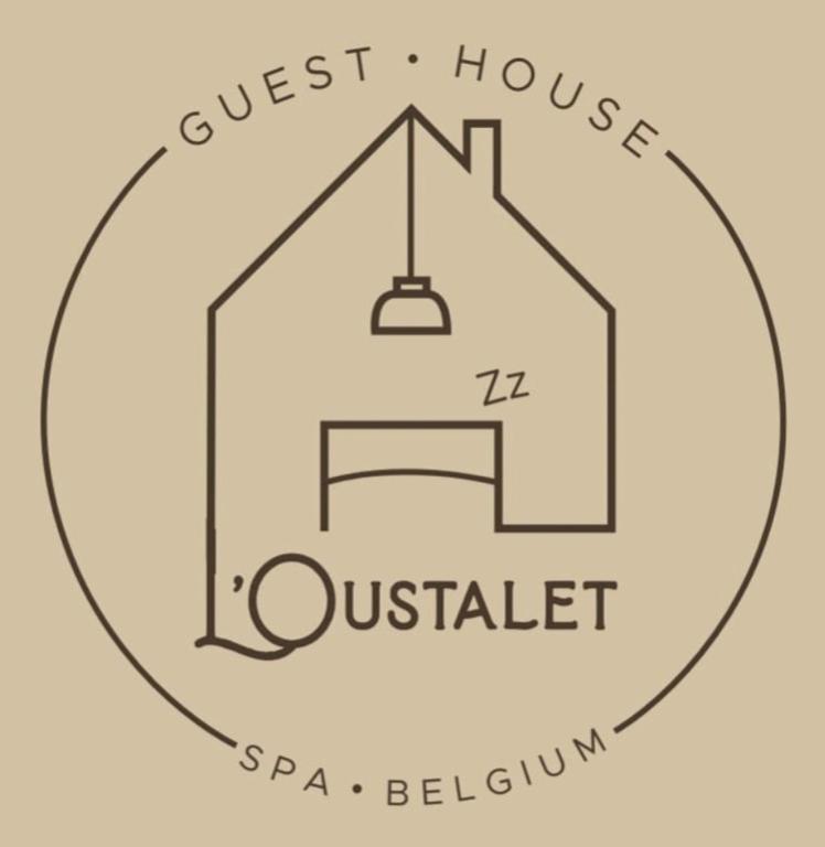 un logo pour la maison d&#39;hôtes du sifflet dans l&#39;établissement Oustalet Spa, à Spa