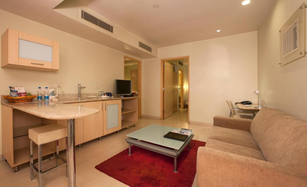 Kuchyň nebo kuchyňský kout v ubytování Avalon Courtyard Residence Suites