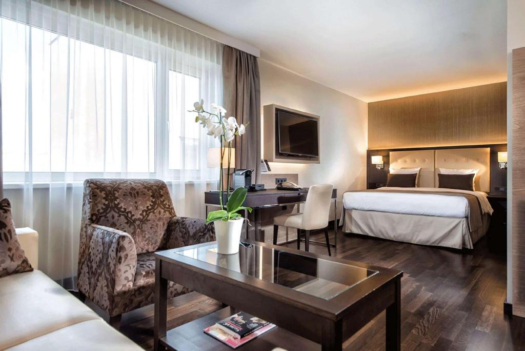 Posteľ alebo postele v izbe v ubytovaní Wyndham Grand Salzburg Conference Centre