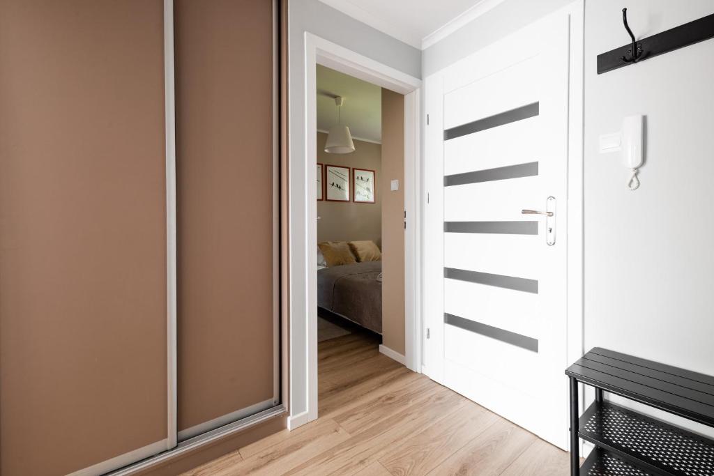 Posteľ alebo postele v izbe v ubytovaní Apartament Renatek Centrum Zakopane