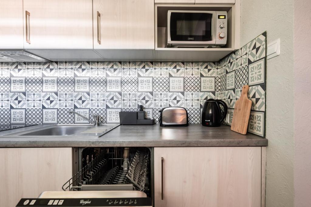 Kuchyňa alebo kuchynka v ubytovaní Apartament Renatek Centrum Zakopane