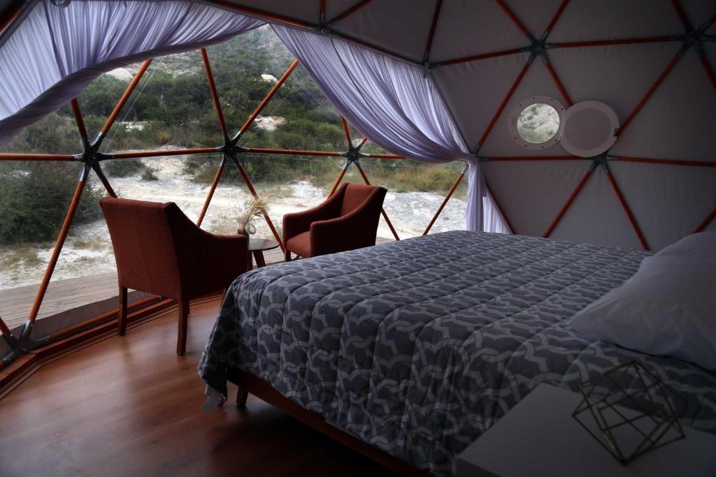 Postel nebo postele na pokoji v ubytování Cool Glamping Bernal
