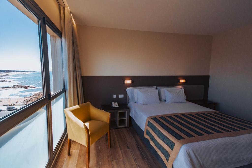 Postel nebo postele na pokoji v ubytování SEC Hotel