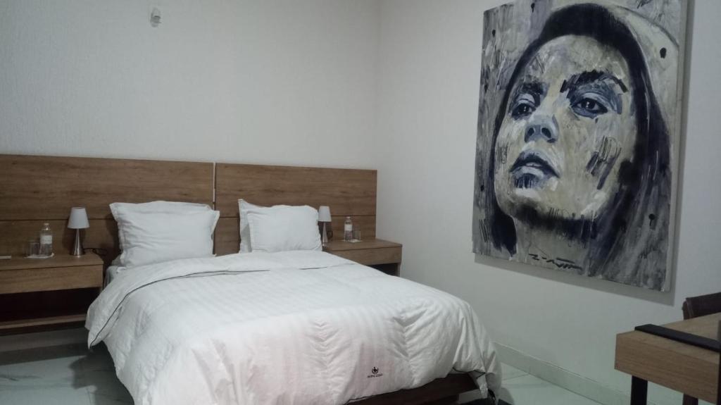 Postel nebo postele na pokoji v ubytování Vía Real Hotel Boutique