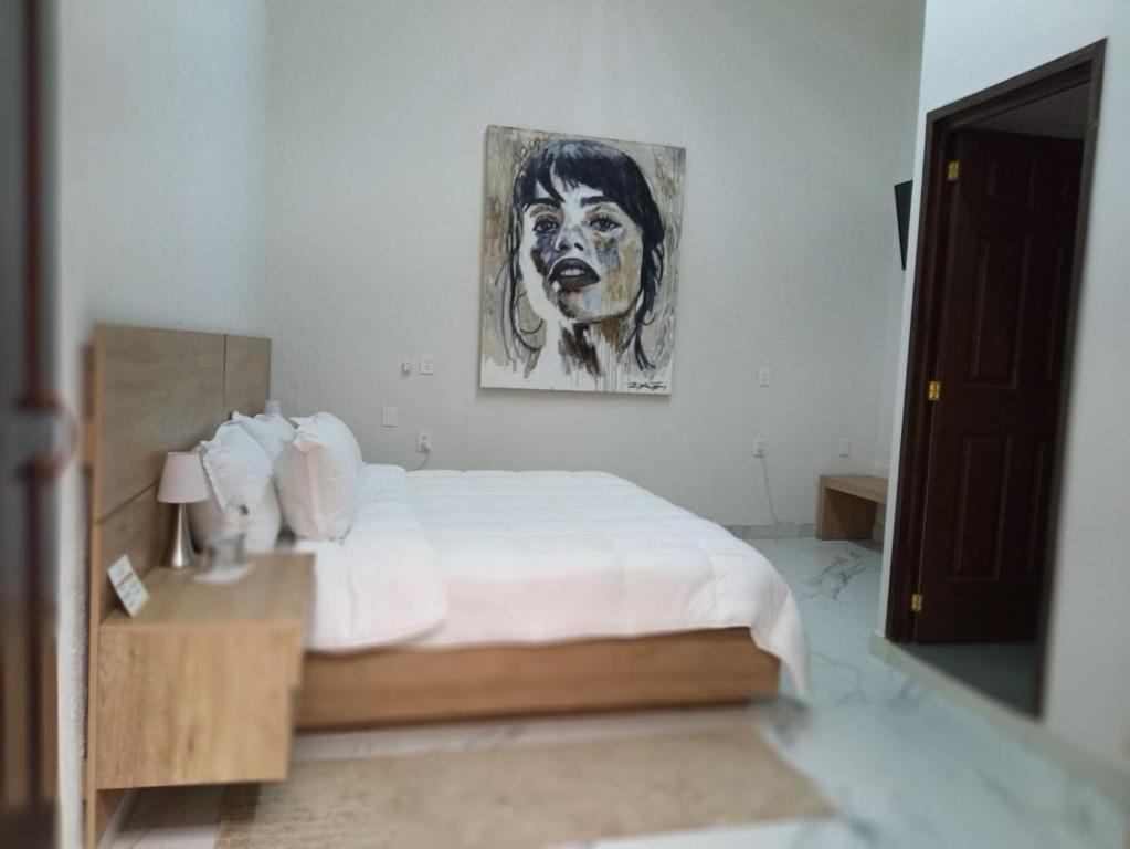 Postel nebo postele na pokoji v ubytování Vía Real Hotel Boutique