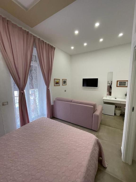 TV a/nebo společenská místnost v ubytování B&B 80056 Ercolano