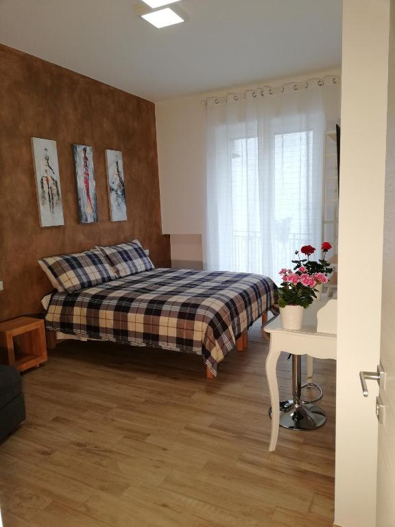 Postel nebo postele na pokoji v ubytování DAMALU'