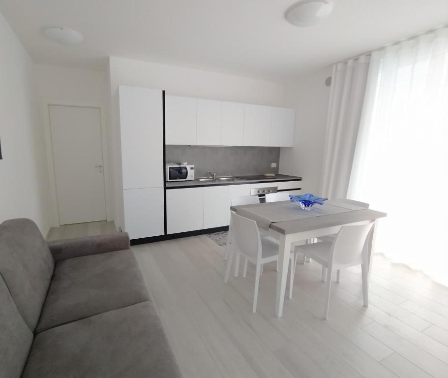 Kuchyň nebo kuchyňský kout v ubytování Jesolo Appartamenti F2 - Ocean Blue