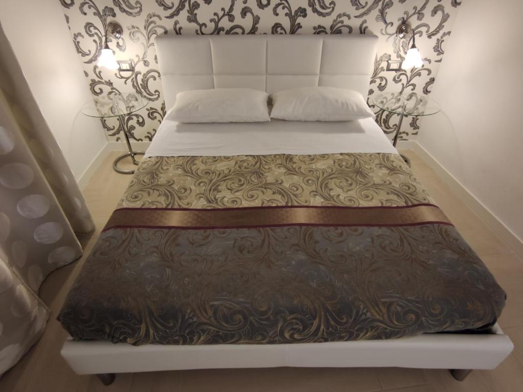 Posteľ alebo postele v izbe v ubytovaní SAMI Rooms - Teatro a 400 mt - Ortigia a 1500 mt -