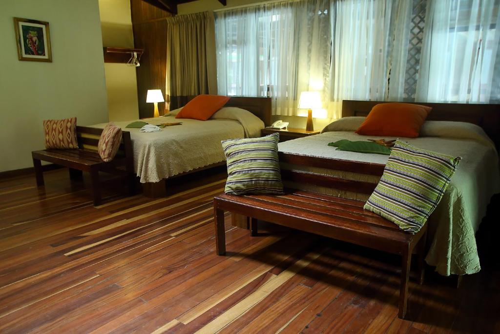 Postel nebo postele na pokoji v ubytování Selva Verde Lodge