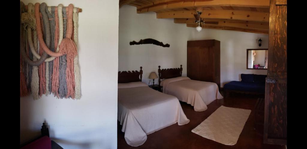 Postel nebo postele na pokoji v ubytování Cortijo 7