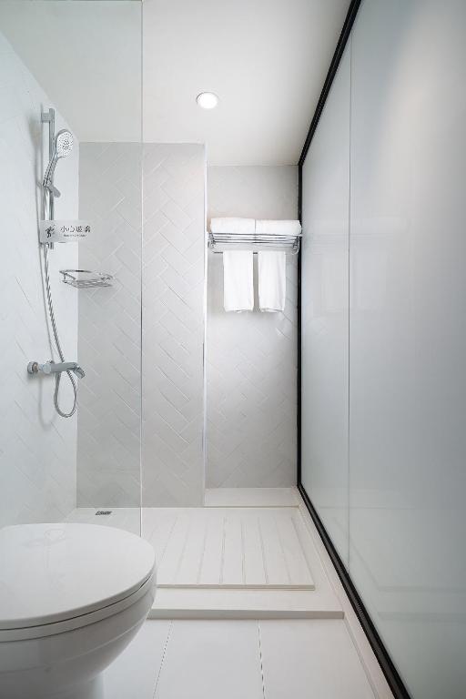 Koupelna v ubytování 有集城市客栈锦绣中华店Unijoy Cityinn Splendid China Shenzhen