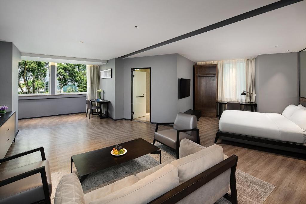 Postel nebo postele na pokoji v ubytování 有集城市客栈锦绣中华店Unijoy Cityinn Splendid China Shenzhen