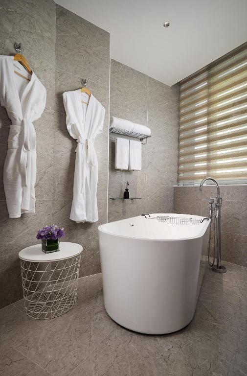 Koupelna v ubytování 有集城市客栈锦绣中华店Unijoy Cityinn Splendid China Shenzhen