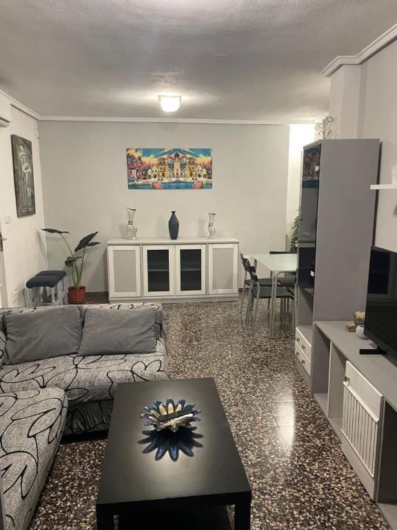 A seating area at APARTAMENTO TURISTICO MILLAN