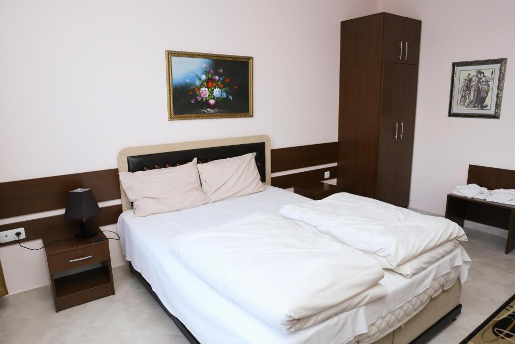 Postel nebo postele na pokoji v ubytování Hotel & Restaurant Ida