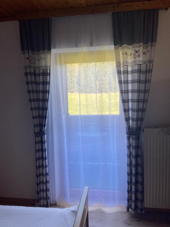 Postel nebo postele na pokoji v ubytování Haus Sperleiten