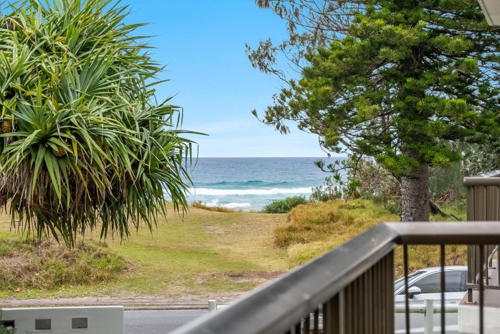 a view of the ocean from the balcony of a house at Wintersview 9 - Lennox Head in Lennox Head