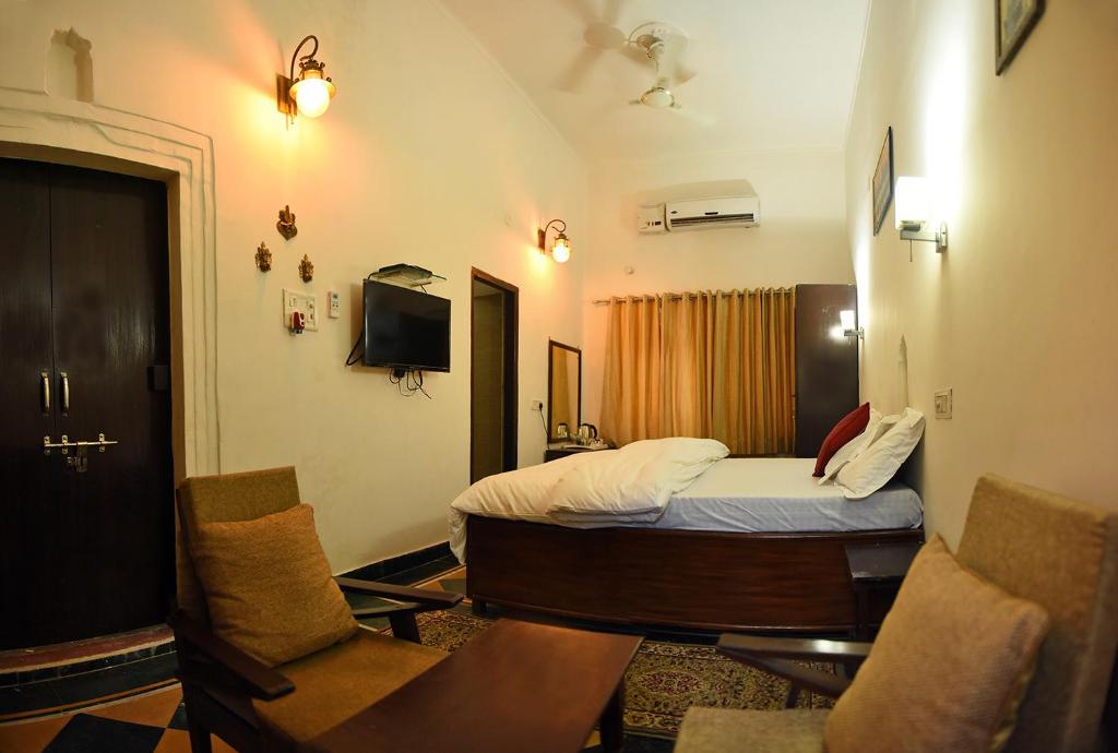 Postel nebo postele na pokoji v ubytování Patnimal Guesthouse