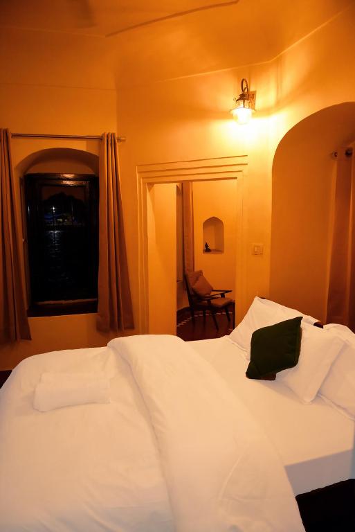 Postel nebo postele na pokoji v ubytování Patnimal Guesthouse