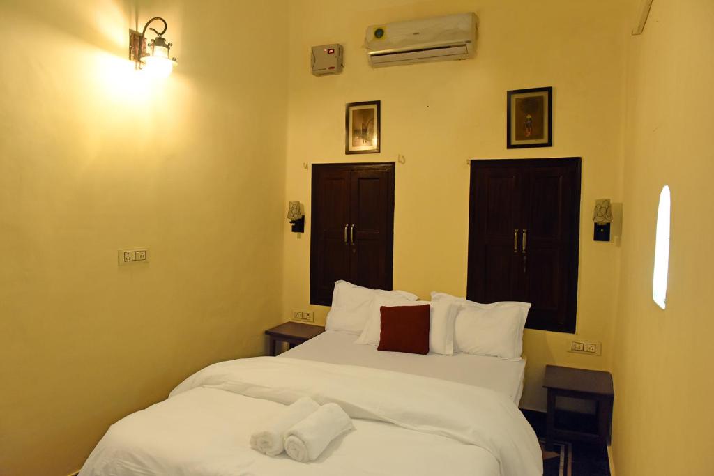 Postel nebo postele na pokoji v ubytování Patnimal Guesthouse