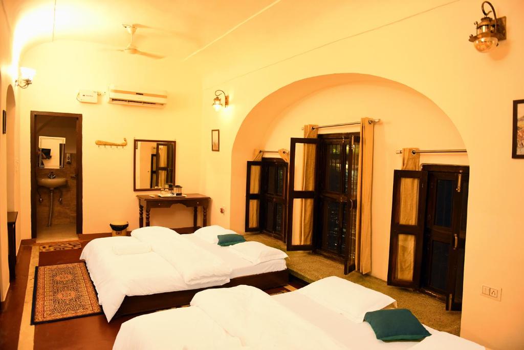 Postel nebo postele na pokoji v ubytování Patnimal Guesthouse