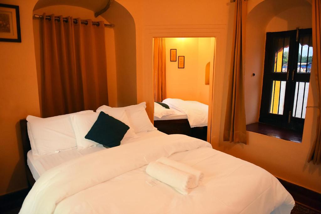 Postel nebo postele na pokoji v ubytování Patnimal Guesthouse