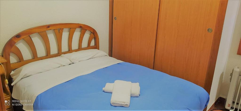 Postel nebo postele na pokoji v ubytování SKI MONTBLANC SIERRA NEVADA & Zona Baja