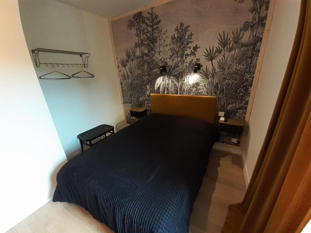 Postel nebo postele na pokoji v ubytování Un je ne sais quoi de Paradis