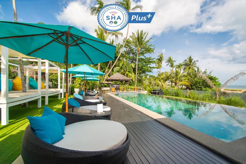 - Vistas a la piscina del complejo de 6 sentidos en Zara Beach Resort Koh Samui - SHA Extra Plus Certified, en Lamai
