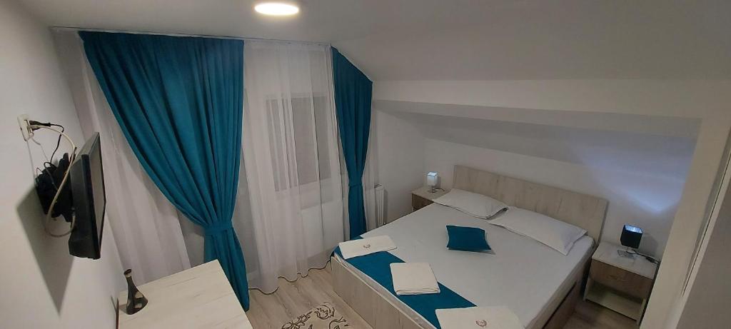 Postel nebo postele na pokoji v ubytování Cabana Mea STRAJA