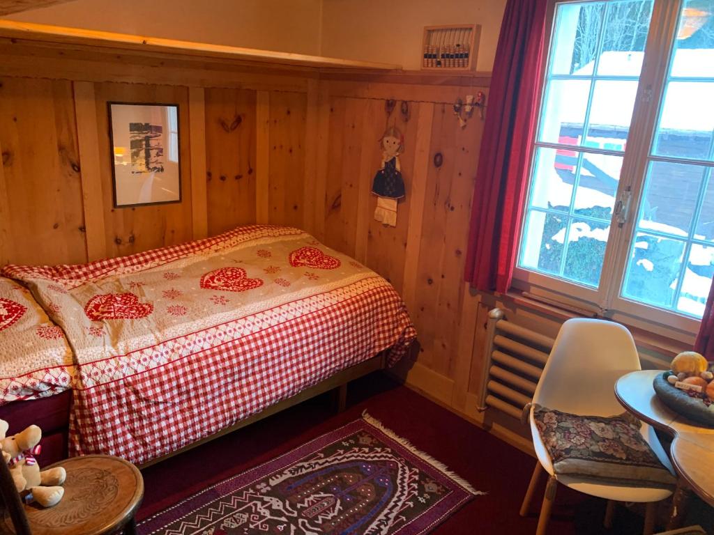 Postel nebo postele na pokoji v ubytování Flumserberg