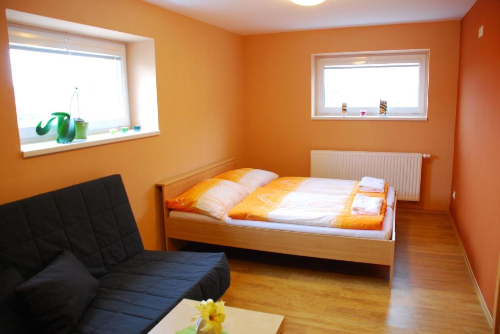Postel nebo postele na pokoji v ubytování Vinařství Novotný