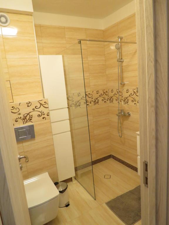 Koupelna v ubytování Апартхотел Б501.
