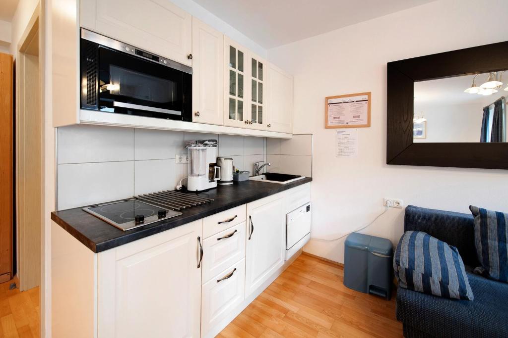 Kuchyňa alebo kuchynka v ubytovaní Haus Lowe Apartment Erdgeschoss 1