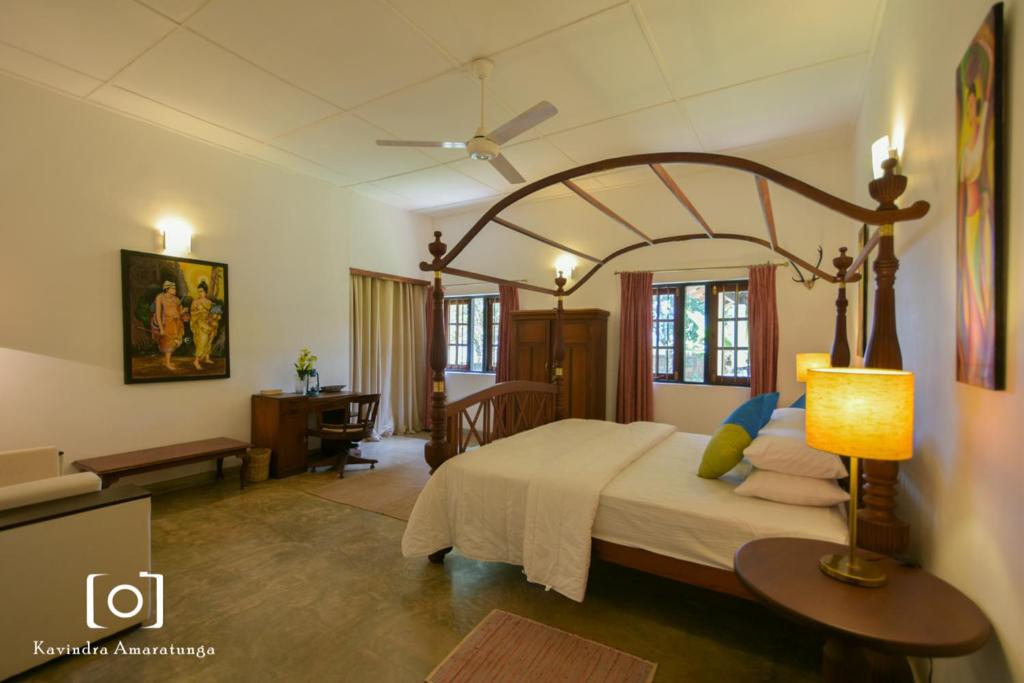 Postel nebo postele na pokoji v ubytování Captain's Bungalow, Kandy