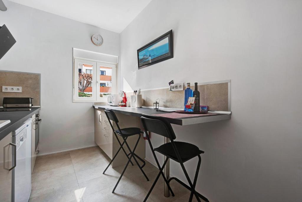 Kuchyň nebo kuchyňský kout v ubytování Apartment Fantastico 4