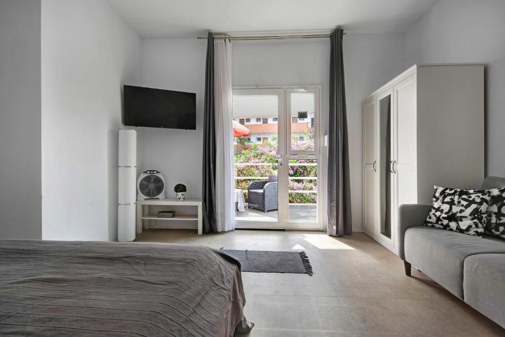 Postel nebo postele na pokoji v ubytování Apartment Fantastico 4
