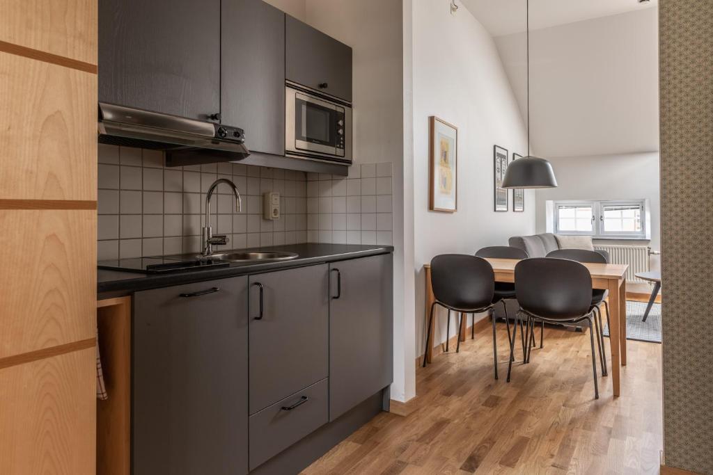 Cuisine ou kitchenette dans l'établissement The More Hotel Mazetti