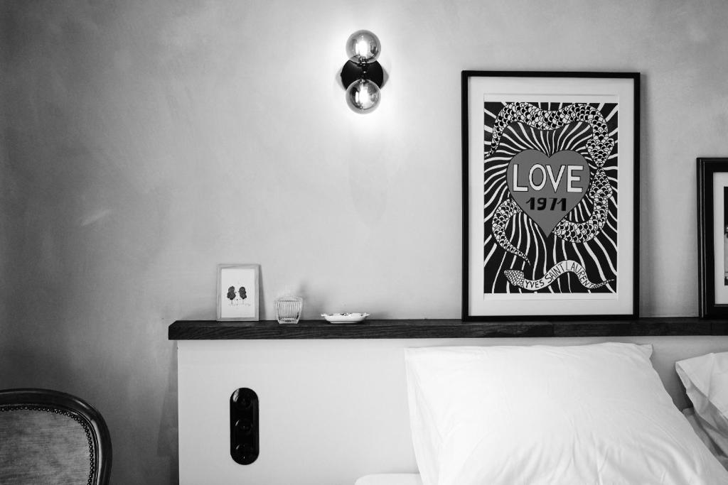 Postel nebo postele na pokoji v ubytování Boutique Hotel & Restaurant Frenchie