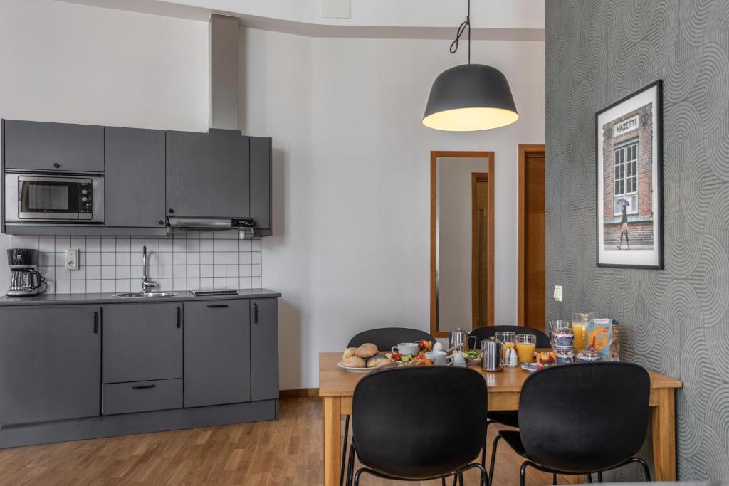 Cuisine ou kitchenette dans l'établissement The More Hotel Mazetti