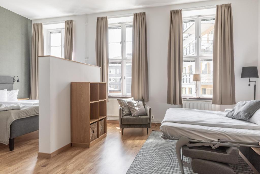 Un ou plusieurs lits dans un hébergement de l'établissement The More Hotel Mazetti