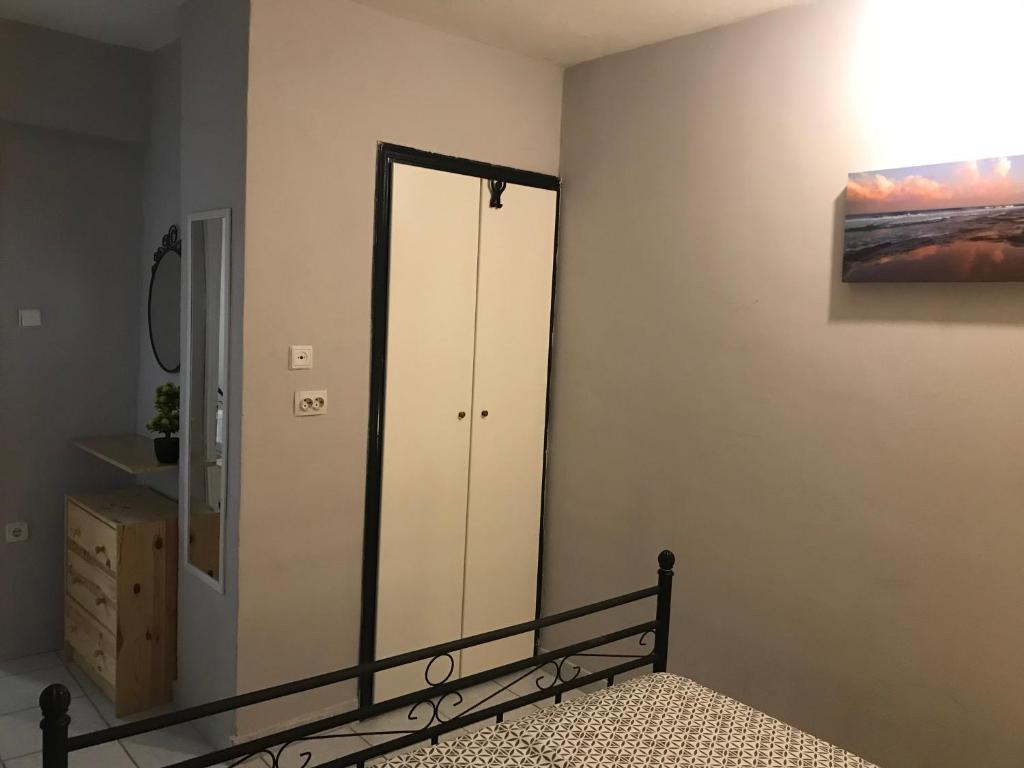 Postel nebo postele na pokoji v ubytování Istos Apartment