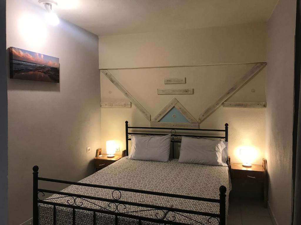 Postel nebo postele na pokoji v ubytování Istos Apartment
