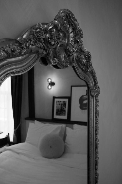 Postel nebo postele na pokoji v ubytování Boutique Hotel & Restaurant Frenchie