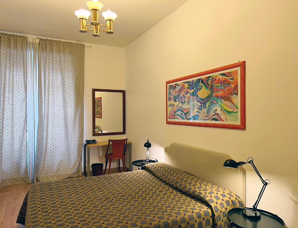 Postel nebo postele na pokoji v ubytování Hotel King